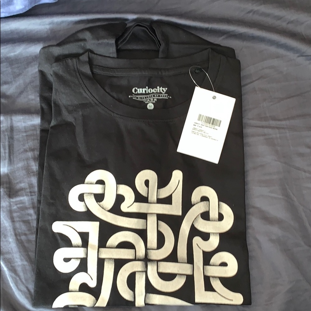 Curiocity T-shirt size Medium New With Tags